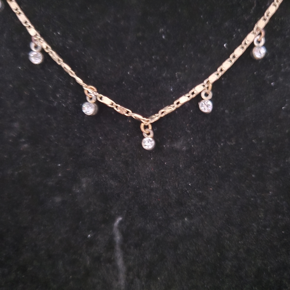Chic Gold Necklace with Silver Charms